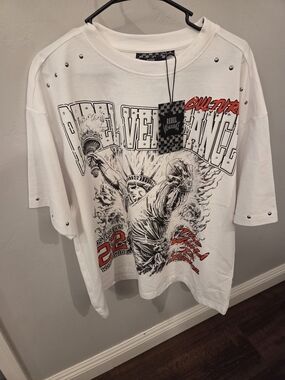 Oversized Rebel Vengeance Statue of Liberty graphic t-shirt features studded